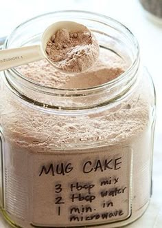 a jar filled with cake mix on top of a table