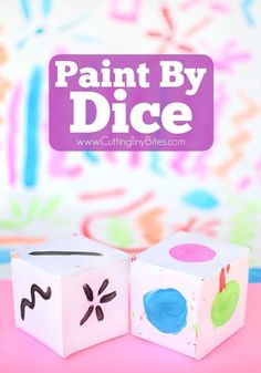 two cubes with paint by dice on them and the words painted by dice above it