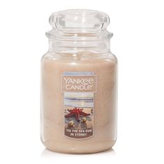 yankee candle in a glass jar on a white background