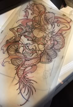 a tattoo design on the side of a table