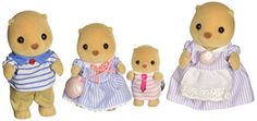 three teddy bears dressed in different outfits