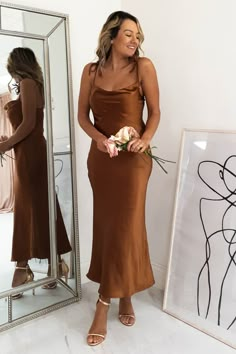 Approx length: 110cm Cowl neckline True to size Silky Stretchy fabric 100% Polyester Colour: Rust Care: Hand was only - Iron inside out on low heat Model is wearing size 8 Model is 5'3 height Copper Bridesmaid Dresses, Brown Satin Dress, Brown Silk Dress, Mocha Dress, Oh Hello Clothing, Brown Bridesmaid Dresses, Rust Bridesmaid Dress, Silk Bridesmaid Dresses, Maid Of Honour Dresses