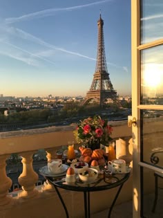 breakfast on the balcony overlooking the eiffel tower