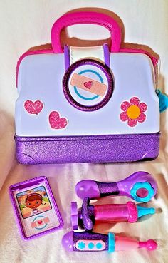 Disney Jr Doc Mcstuffins Doctor Kit with 5 Accessories White Purple Sparkles Dr Mcstuffins, Kids Doctor Set, Doctor Toy Set, Lamb From Doc Mcstuffins, Disney Princess Toys Play Sets, Disney Doc Mcstuffins, Purple Sparkle, Doc Mcstuffins, Childrens Games