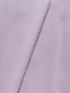 a close up shot of the fabric material for a dress shirt in light purple color