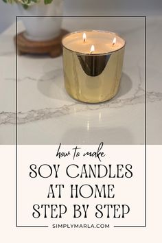 a candle sitting on top of a table next to a vase with flowers in it and the words how to make soy candles at home step by step