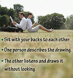 two people sitting in the grass with their backs to each other