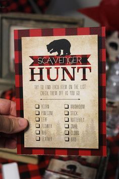 a person holding up a scavenger hunt card