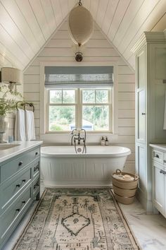 a bathroom with a large rug on the floor and a bathtub in the corner