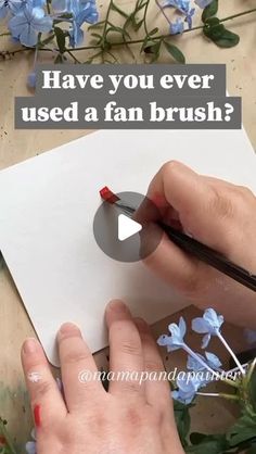 someone is using a pen to draw flowers on paper with the words have you ever used a fan brush?