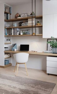 a room with a desk, chair and bookshelf next to a large window