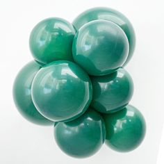 Pack of 25 These 24" round solid color Crystal Emerald Green latex balloons from TUFTEX are perfect for making balloon arches, balloon columns, balloon clusters, and other balloon decorations. Color coordinate these latex balloons with themed foil mylar balloons for the ultimate balloon bouquet! Package includes 25 - 24" TUFTEX Crystal Emerald Green latex balloons. The balloons can be inflated with helium to float. Balloon arrives uninflated. Round Balloons, Balloon Weights, Hand Pump, Balloon Bouquet