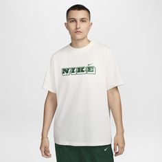 Made with soft, lightweight cotton and a loose fit, this roomy tee provides effortless style and comfort all day long. Athleisure Short Sleeve T-shirt For Leisure, Oversized Nike Cotton T-shirt, White Athleisure T-shirt For Spring, Green Crew Neck T-shirt For Leisure, Green Crew Neck T-shirt, Short Sleeve Athleisure T-shirt For Leisure, Relaxed Fit T-shirt For Leisure In Athleisure Style, Sporty Tops With Relaxed Fit For Leisure, Relaxed White T-shirt With Graphic Print