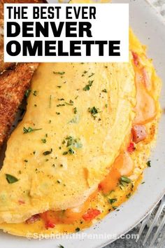 the best ever denver omelette recipe on a white plate with toast and vegetables