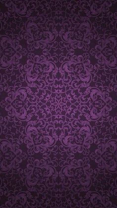 an ornate purple background with swirls on it