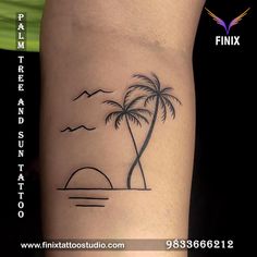 a small palm tree tattoo on the arm