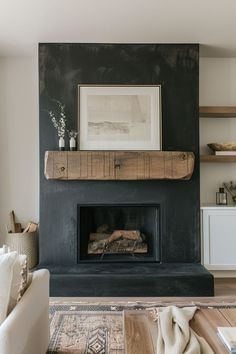 a living room filled with furniture and a fire place