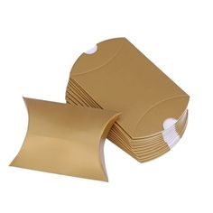 several rolls of brown paper are stacked on top of each other