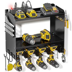 a black shelf with yellow and black tools on it's sides, including drillers