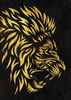 a black and gold lion head painted on the side of a wall