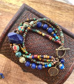 Bohemian Lapis Lazuli Jewelry With Gemstone Beads, Bohemian Lapis Lazuli Beaded Bracelets With Natural Stones, Beaded Lapis Lazuli Bracelet, Bohemian Beaded Bracelets With Lapis Lazuli, Chakra Bracelet Jewelry, Turquoise Hand-wrapped Hippie Beaded Bracelets, Czech Glass Necklace, Moroccan Jewelry