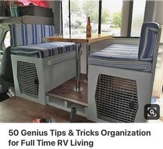 the inside of a camper with two chairs and a table