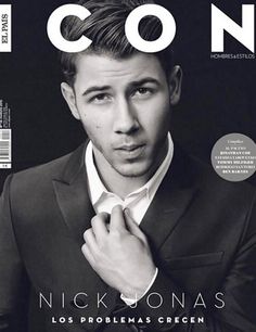 a man in a suit and tie is featured on the cover of a magazine,