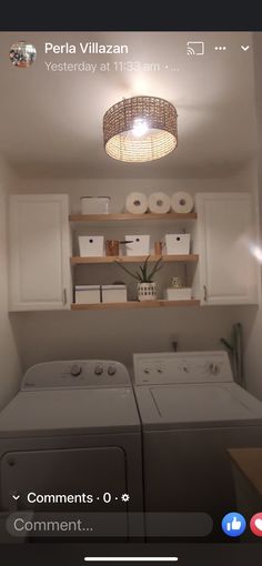 a washer and dryer sitting in a room next to each other with the lights on