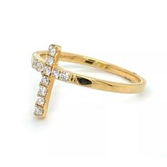 This is a beautiful and elegant piece of jewelry, it is a cute Cross ring crafted from solid 14k yellow gold with a fine polished finish, the Cross is adorned with round cut sparkling diamonds and it is set at the front of the band.  Add this fine piece and will make a heart warming gift for your loved one.    Material: 14k yellow gold       Hallmark: Odella 14k  Measurements: Top size: 8mm across x 12mm long x 3mm high    Ring Size:  7    17mm across the inside of the band  Diamonds: 19 points Gold Cross Ring, Ariel Wedding, Cute Cross, Heart Warming, Cross Ring, Ring Crafts, Gold Cross, Sparkle Diamonds, Ring Size 7