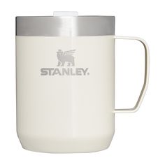 a white travel mug with the word stanley on it