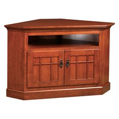 a wooden entertainment center with doors on the front and side panels, in an oak finish