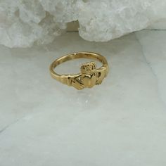 14K Yellow Gold Claddagh Ring, Size 7.75, 4.1 grams Stock # BRT04-R66 This listing contains photographs of the actual item you will receive. Our items are in excellent condition with little or no signs of wear and many are one of a kind pre-owned estate finds. Please look closely at the pictures in this listing as they are part of the product description. Please read the description, as any imperfections or condition comments will be included. We do our best to accurately describe the condition Grandma Jewelry, Gold Claddagh Ring, Claddagh Ring, Claddagh Rings, Jewelry Lookbook, Fine Jewelry Designers, Gift Jewelry, Trading Company, Ring Size 7