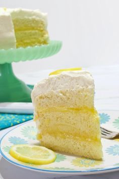 A slice of lemon chiffon cake. Lemon Heaven Sponge Cake, Lemon Curd Sponge Cake, Light And Fluffy Lemon Cake, Lemon Fluff Cake, How To Decorate A Lemon Cake, Chiffon Sponge Cake Recipe, Fancy Lemon Cake, Lemon Zest Cake, Lemon Filling Cake