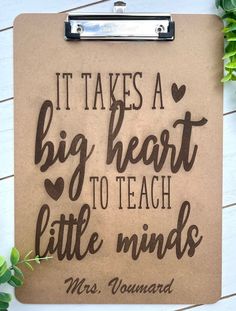 a clipboard with the words, it takes a big heart to teach little minds