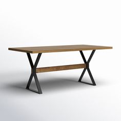 a wooden table with black metal legs on a white background