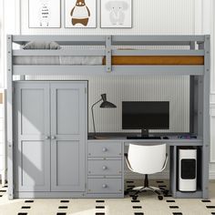 a gray bunk bed with desk and computer