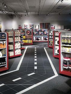 the inside of a liquor store with many shelves