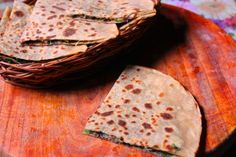 some tortillas are sitting in a wicker basket