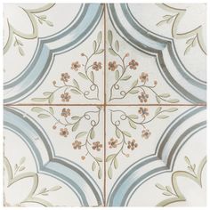 an artistic tile design with flowers and leaves