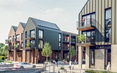 an artist's rendering of a row of townhouses with cars parked on the street