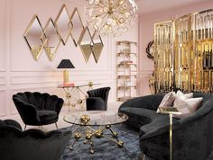 a living room filled with black furniture and gold accents