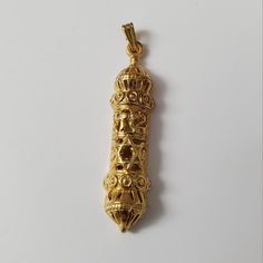 The Listing Displays An Intricately Designed Gold Mezuzah Pendant With Rich Details And Traditional Elements. The Pendant Is Shaped Like A Cylindrical Case, Featuring Ornate Filigree Work And Embossed Patterns That Enhance Its Elegance. In The Center, There Is A Prominent Star Of David, A Symbol Often Associated With Jewish Heritage And Spirituality. Above The Star, Hebrew Letters Are Etched, Adding To The Pendant's Cultural Significance. The Top And Bottom Of The Pendant Have Dome-Like Structur Birthday Proposal, Brides Mom, Jewish Heritage, Hebrew Letters, Decorative Elements, Star Of David, Turquoise Jewelry, The Star, Womens Jewelry Necklace