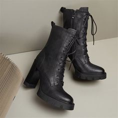 Indulge in the luxurious, winter-ready charm of these women's boots, meticulously crafted from superior cow leather with a distinct round toe design. The lace-up closure ensures a secure fit, while the pigskin insole and lining, along with the rubber outsole, deliver unmatched comfort and durability. Elevated by a chic platform and heel, these boots bring an undeniable sophistication to your cold-weather wardrobe. Why wait? Step into luxury today and elevate your style with these timeless boots. Winter Lace-up Ankle Boots With Leather Sole, Winter Lace-up Platform Boots With Leather Sole, Winter Moto Boots With Reinforced Heel And Almond Toe, Winter Boots With Front Lace-up Fastening And Round Toe, Winter Martin Boots With Leather Sole In Faux Leather, Winter Heeled Boots With Leather Sole And Round Toe, Winter Lace-up Combat Boots With Leather Sole, Fall Lace-up Platform Boots With Leather Sole, Fall Leather Lace-up Mid-calf Boots