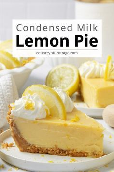 a slice of lemon pie on a plate with the rest of the pie in the background