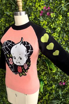 I am so thrilled to announce my newest collab with Kewpie®! The cutest and softest sweater featuring my Kewpie® Spiderweb Love design. With black contrast sleeves with green hearts and contrast collar. This is a fitted sweater so please check the size chart for measurements. Viscose blend. Playful Fitted Long Sleeve Sweater, Quirky Sweaters, Funky Style Outfits, Funky Clothes, Job Clothes, Luanna Perez, Green Hearts, Love Sweater, Clothes Reference