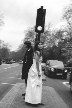 Bride and groom crossing the street in front of Somerset House. London Elopement Photography, Couple Photo London, London Prewedding Photography, London Wedding Photography, London Town Hall Wedding, London City Wedding Photography