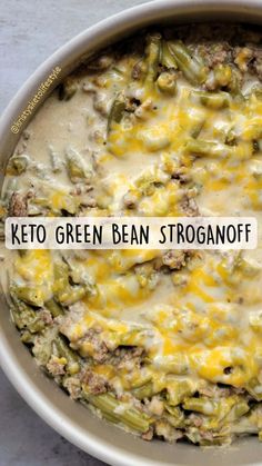 keto green bean stroganooffi in a white bowl with the words, keto green bean stroganooffi