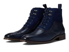 Stacy Adams Malone Wing Tip Lace-Up Boot - Men's Shoes : Navy : Featuring eye-catching perforations and serrations on the upper and incorporated with a cushioned footbed, the Stacy Adams Malone Wing Tip Lace-Up Boots speak of classic elegance and uplifted comfort. Leather and suede upper. Leather lining. Leather-covered footbed with memory foam cushioning for exceptional comfort. Classic lace-up construction with metal eyelets. Pull loop for easy on and off. Wingtip pointed toe cap. Stacked heel Navy Boots, Classic Elegance, Leather Cover, Stacked Heel, Lace Up Boots, Boots Men, Combat Boots, Memory Foam, Womens Boots