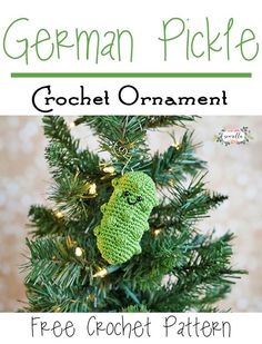 a crochet ornament hanging from a christmas tree with the text, free pattern