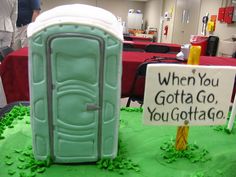 a green cake with a sign that says when you gota go, you gotagoo